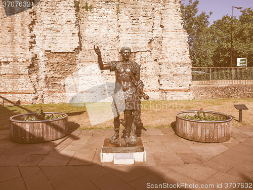 Image of Retro looking Trajan statue in London