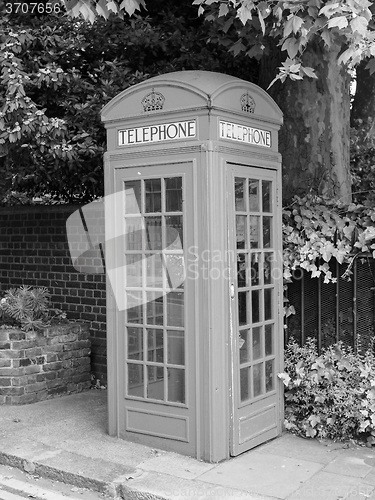 Image of Black and white Red phone box in London