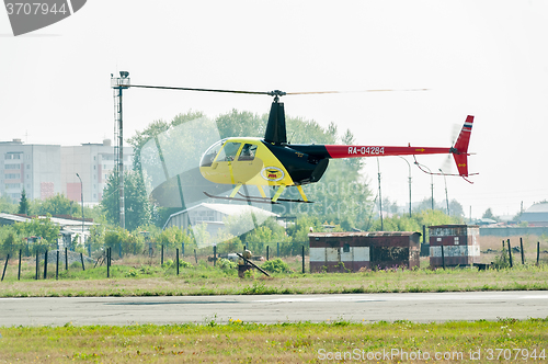 Image of Piloting of Robinson R44 Raven on airshow