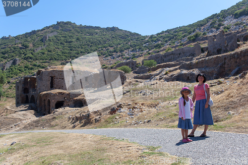 Image of Mother and daughter in old city