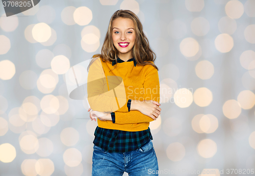 Image of happy young woman or teen girl in casual clothes
