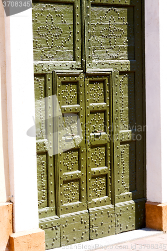 Image of detail in  wall door  italy  architecture   historical  