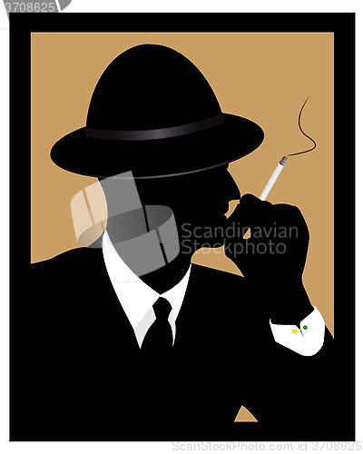 Image of a man smokes a cigarette