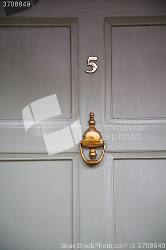 Image of handle in london  brass nail  light