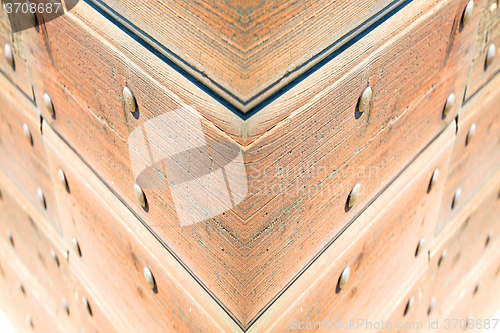 Image of abstract  of a brown antique   door in italy   europe