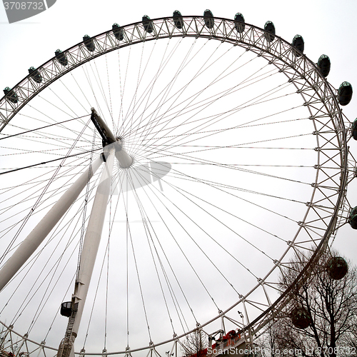 Image of london eye in the spring sky and white clouds