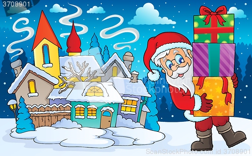 Image of Santa Claus with gifts in winter scenery