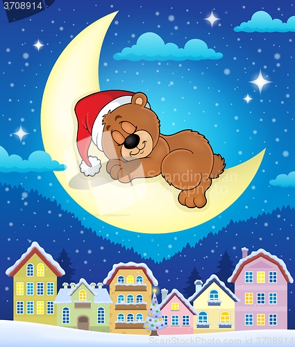 Image of Christmas town with sleeping bear