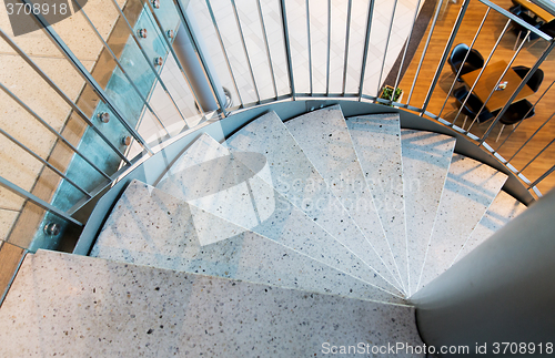 Image of close up of stone spiral staircase at restaurant