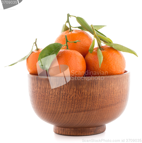 Image of Tangerines on wooden  bowl 