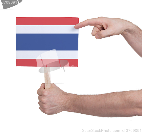 Image of Hand holding small card - Flag of Thailand