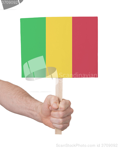 Image of Hand holding small card - Flag of Mali