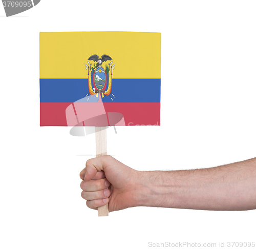 Image of Hand holding small card - Flag of Ecuador