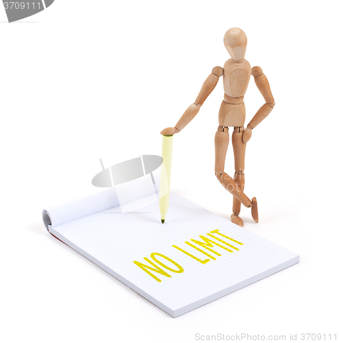 Image of Wooden mannequin writing - No limit