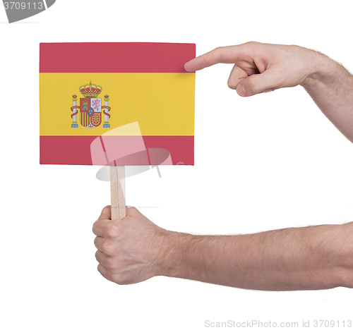 Image of Hand holding small card - Flag of Spain