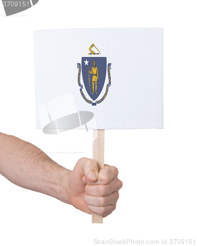 Image of Hand holding small card - Flag of Massachusetts