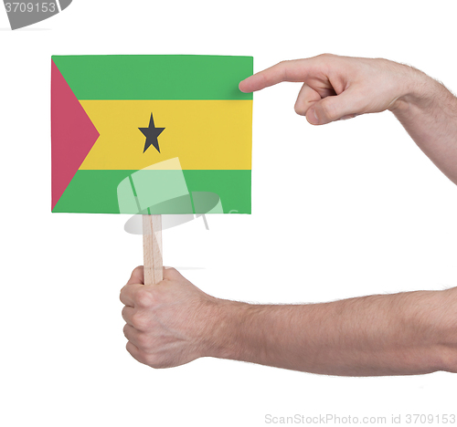 Image of Hand holding small card - Flag of Sao Tome and Principe