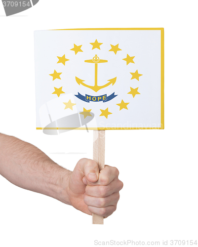Image of Hand holding small card - Flag of Rhode Island