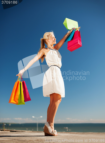 Image of woman with shopping bags