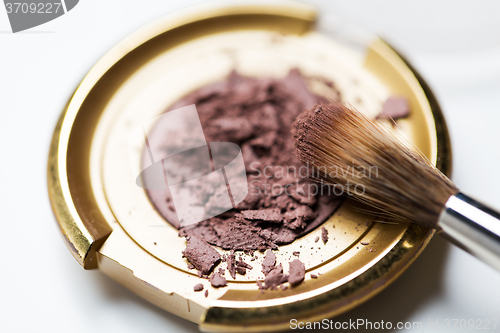 Image of close up of makeup brush and eyeshadow