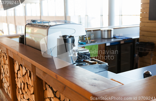 Image of close up of coffee machine at bar or restaurant