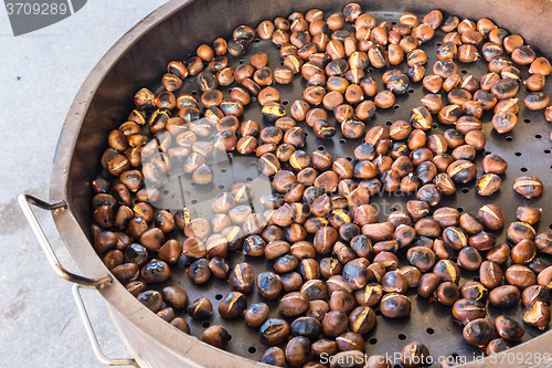 Image of Grilling chestnuts.