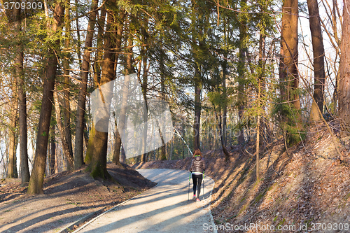 Image of Woman hiking in nature. 