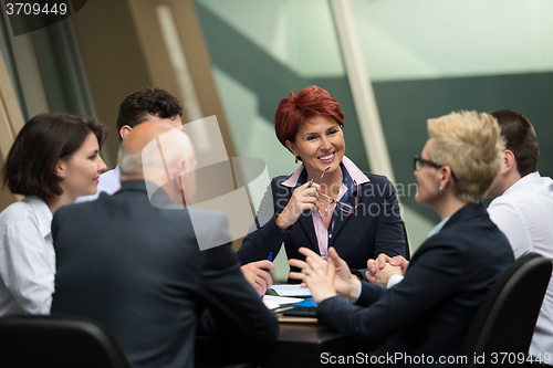 Image of business people group on meeting at modern bright office