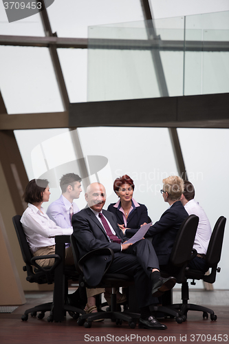 Image of business people group on meeting at modern bright office