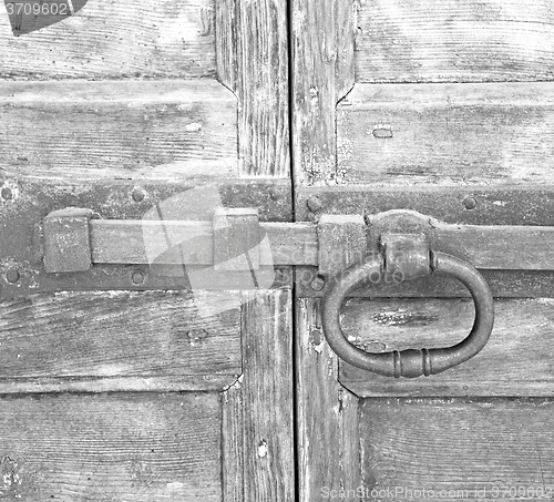 Image of europe old in  italy  antique close brown door and rusty lock  c