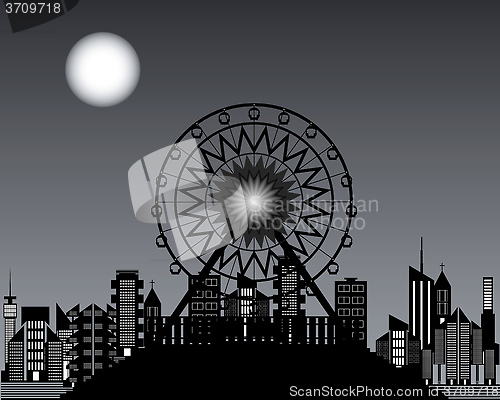 Image of Ferris wheels at night time