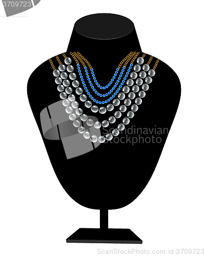 Image of necklaces of pearls and blue stones