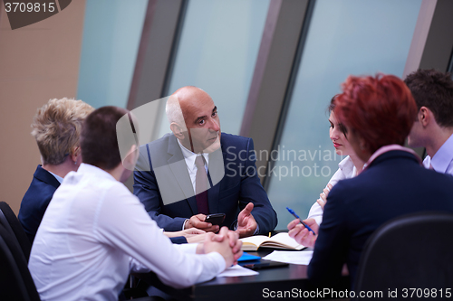 Image of business people group on meeting at modern bright office