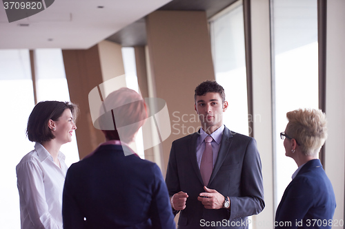 Image of business people group on meeting at modern bright office
