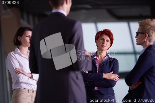 Image of business people group on meeting at modern bright office