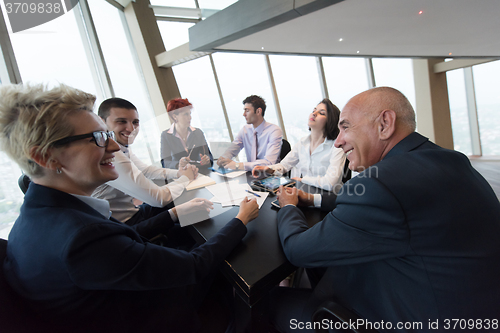 Image of business people group on meeting at modern bright office
