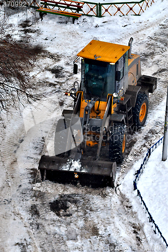 Image of Cleaning of snow from city streets by means of special equipment