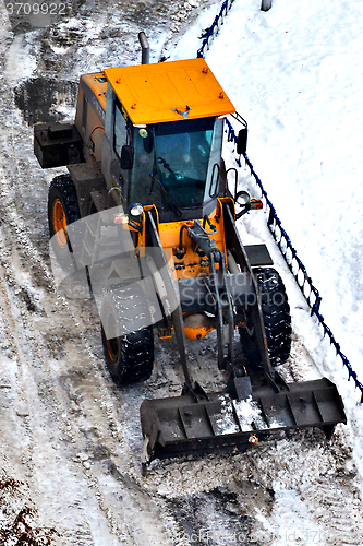 Image of Cleaning of snow from city streets by means of special equipment