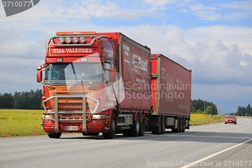 Image of Customized Red Scania Truck Transport