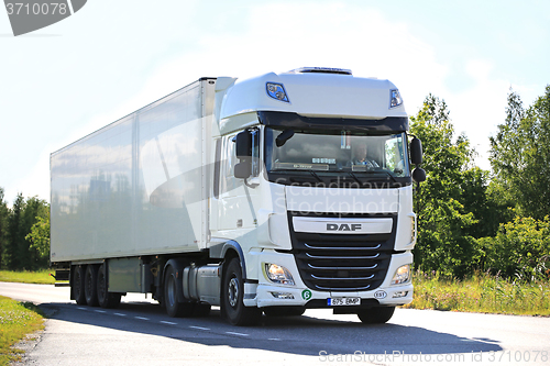 Image of New DAF XF Semi Truck on the Road in Summer