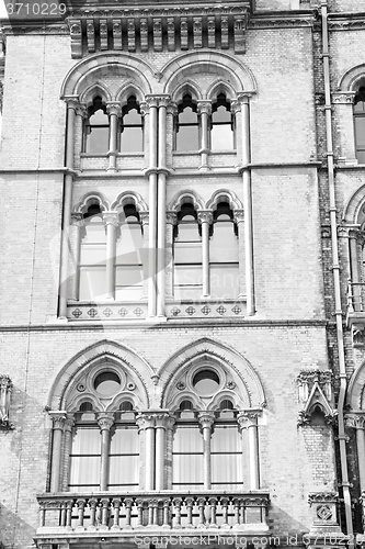 Image of old architecture in london england windows and brick exterior   