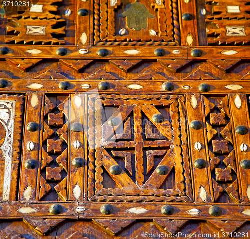 Image of shell  brown  rusty      morocco in africa the old wood  facade 