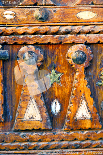 Image of grey metal rusty      morocco in africa the old wood  shell padl
