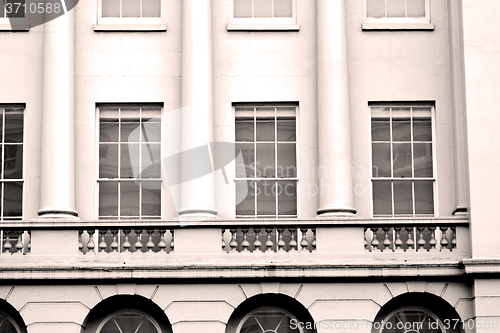 Image of old windon in england london brick and glass the wall 