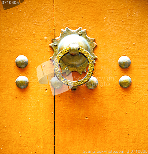 Image of rusty  brown    morocco in africa the old wood  facade home and 