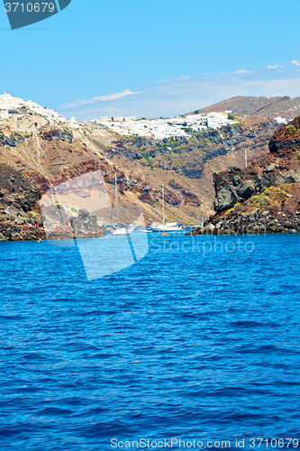 Image of from one    santorini island house and rocks the sky