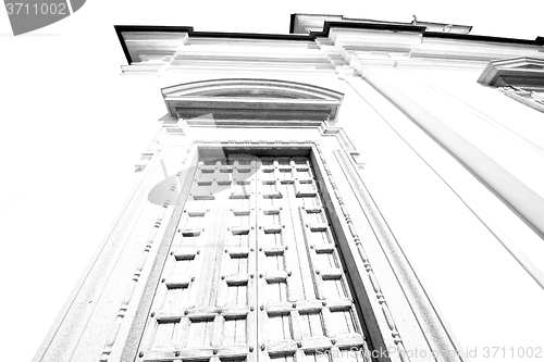 Image of  entrance   door    in italy   ancian wood and traditional  text