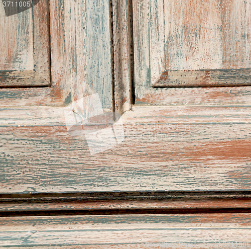 Image of greece home texture of a brown antique wooden old door in santor