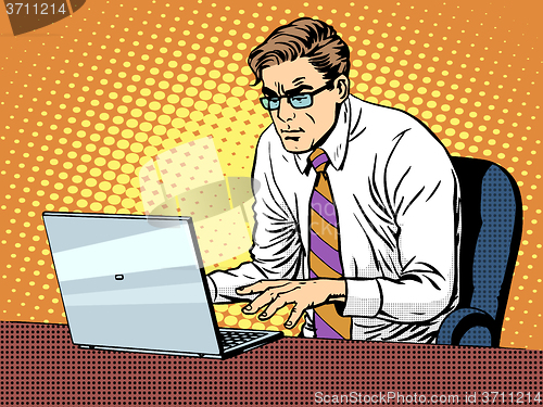 Image of Businessman working on laptop
