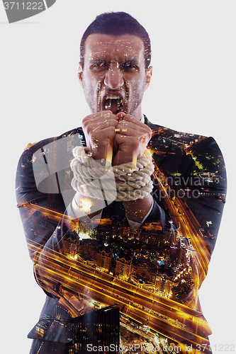 Image of double exposure of business man with rope isolated on white back